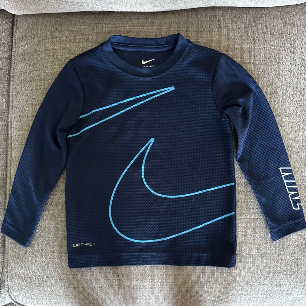 Nike Dark Blue Textured Long Sleeve Shirt with Light Blue Design